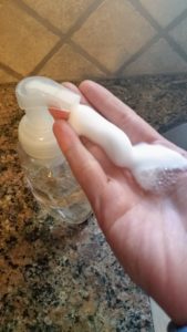 Super Simple Fun DIY Foaming Hand Soap recipe with only two ingredients. It's naturally scented with essential oils. Learn how to make foaming hand soap in minutes - you just need a foaming hand soap dispenser. My 5-year-old whips it up in a flash and you can too. Find out how - click now. Foaming hand soap recipe - FREE printable! @naturalsoapmom.com #handsoaps #handmade #easydiy #easydiyhomedecor #soapmaking #soapmakingsupplies #soapmaker 