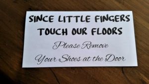 Learn Why You Need a No Shoes In the House Policy if You Have Little Kids. Free printable no shoes sign is a great idea to get people to take off their shoes at the front door. Awesome tips to keep your floors clean and get your now shoes in the house policy kicked off the right way! We track dangerous stuff in on the bottom of our shoes - more than you realize. Keep your kids safe.